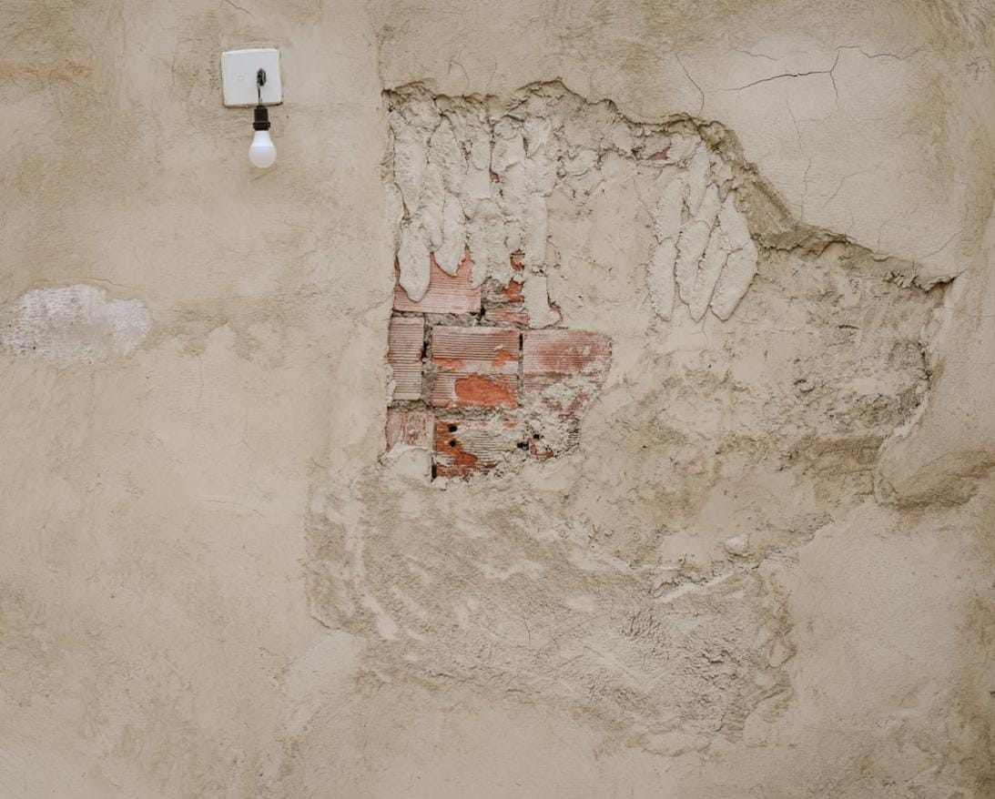 Children and adults engaging with augmented reality educational tools that showcase Neolithic artifacts and settlement layouts.